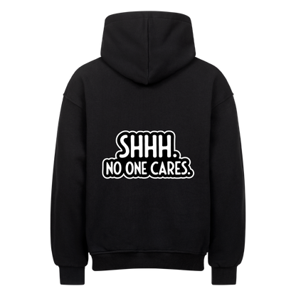 Schwarzer Oversized Statement Hoodie mit „SHHH. NO ONE CARES.“ Rückenprint
